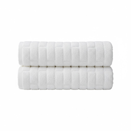 Oversized cotton bath sheet with a plush texture, designed for superior absorbency and a luxurious drying experience