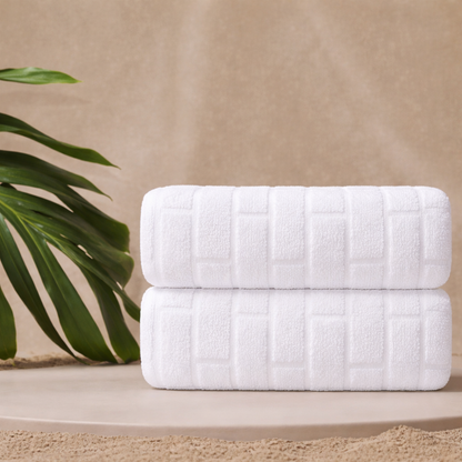 Oversized cotton towel presented in a clean setting, delivering a premium, hotel-style comfort and refined look