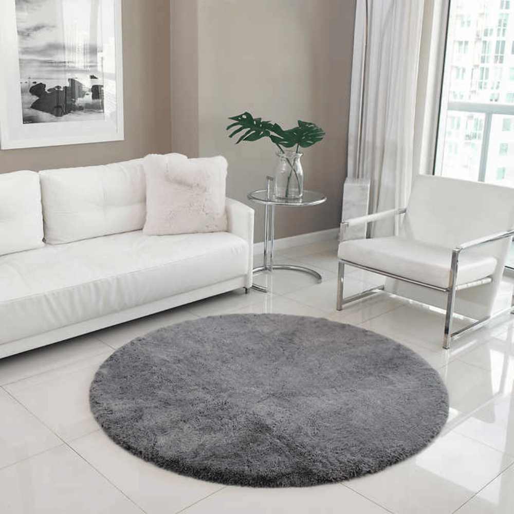 Mon Chateau Round Faux Fur Rug: Luxurious and elegant addition to any space. Soft, plush texture adds warmth and style.