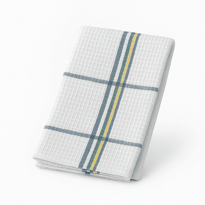 White waffle weave dish towel with blue, green, and yellow stripes, folded for a clean hospitality presentation.