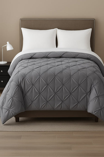 Elegant pintuck duvet cover set for hospitality, includes duvet cover and matching pillow shams.