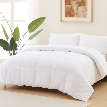 Lightweight white duvet insert neatly folded on a bed for hotel and hospitality use