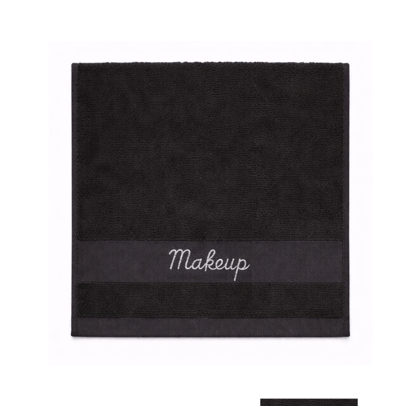 Black makeup towel with embroidered “Makeup” text, soft cotton texture, square shape, ideal for hotel and Airbnb use