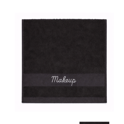 Black makeup towel with embroidered “Makeup” text, soft cotton texture, square shape, ideal for hotel and Airbnb use