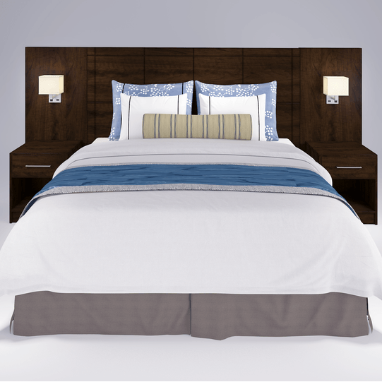Luxury hotel bed with wooden headboard and white linens for modern guest room interior