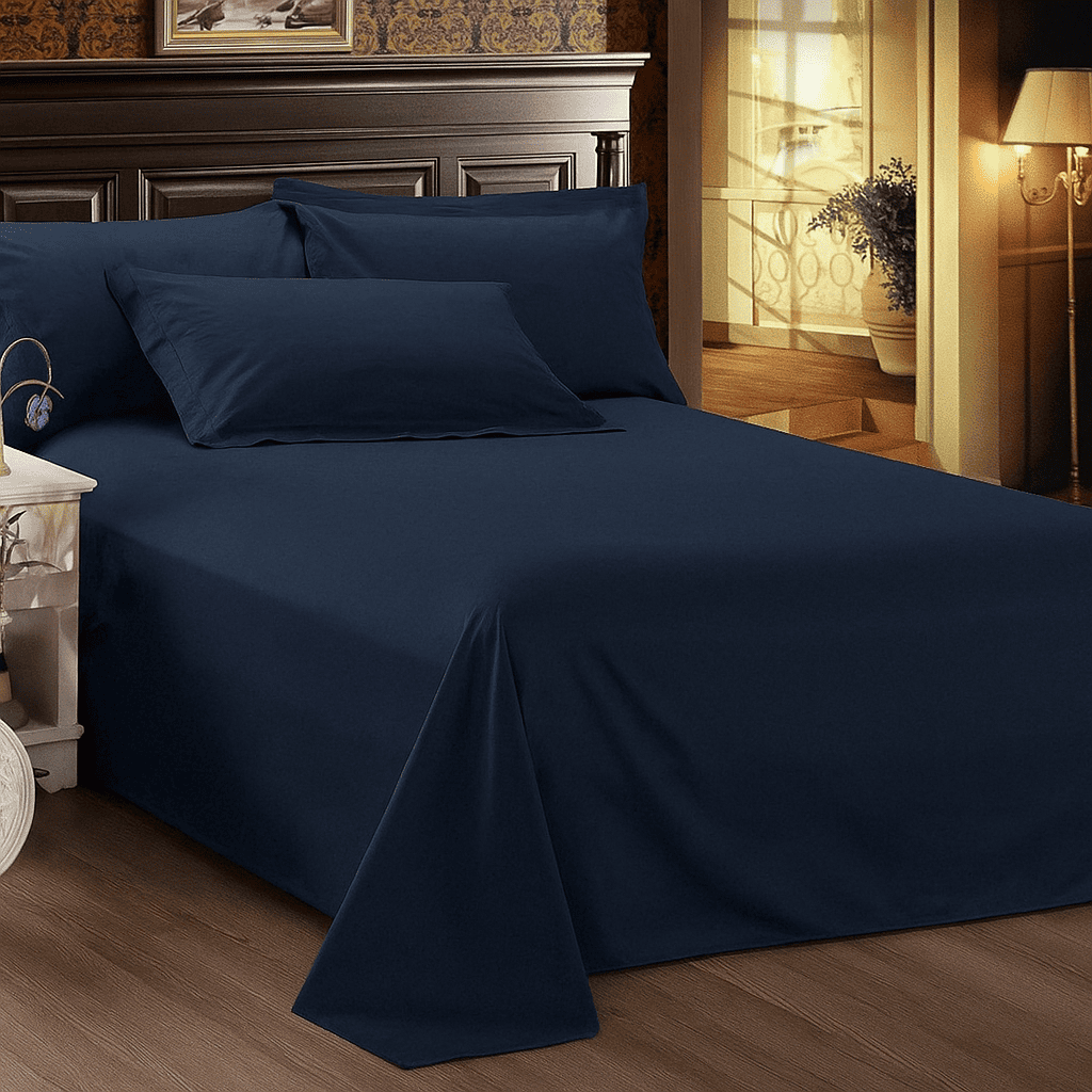 Navy blue bed sheet elegant décor and warm lighting, perfect for resort, Airbnb, hotel and hospitality use.