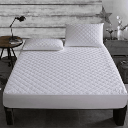 quilted fitted mattress pad for added comfort and mattress protection ideal for home and Airbnb use 