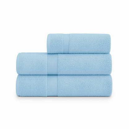 Affordable essential 3-piece sky blue towel set made from 100% combed cotton, soft and durable, perfect for hotels, spas, Airbnbs, or everyday home use
