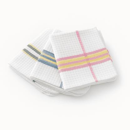 Set of three waffle weave dish towels with colorful stripes, ideal for hotels, resorts, and hospitality kitchens.