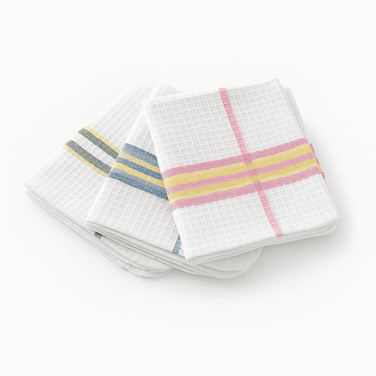 Set of three waffle weave dish towels with colorful stripes, ideal for hotels, resorts, and hospitality kitchens.