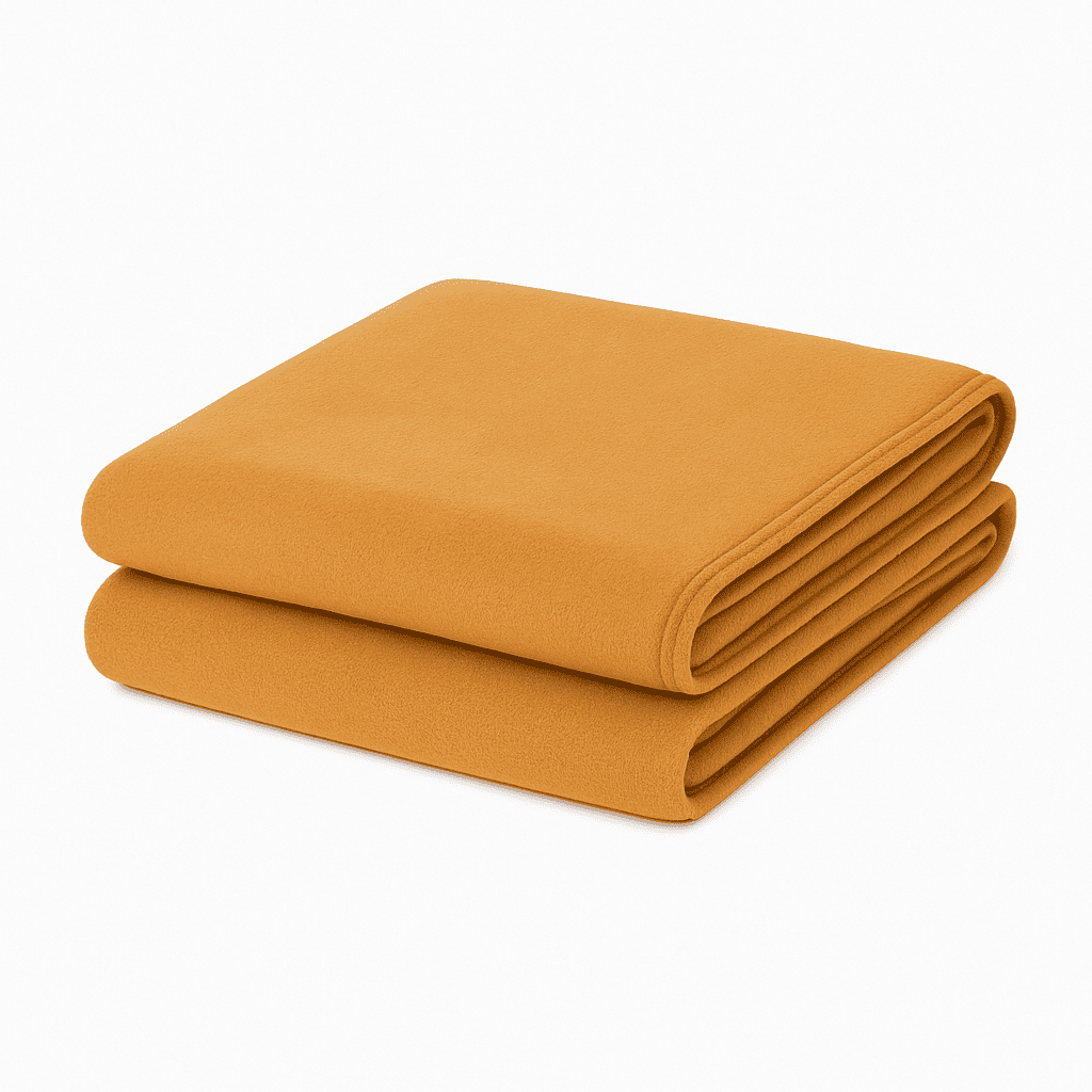 Yellow ocher blanket folded neatly on white background, soft lightweight throw ideal for hotels, resorts, and Airbnb stays.