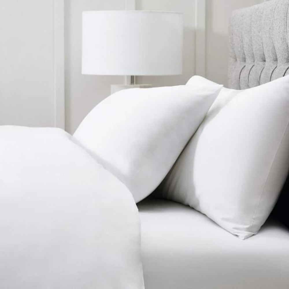 pillow, offering hypoallergenic features and lightweight comfort, perfect for enhancing hotel chain guest rooms.
