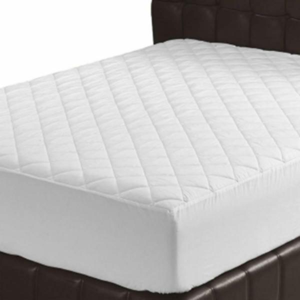Fitted Elastic Skirt Quilted Mattress Pads on the bed