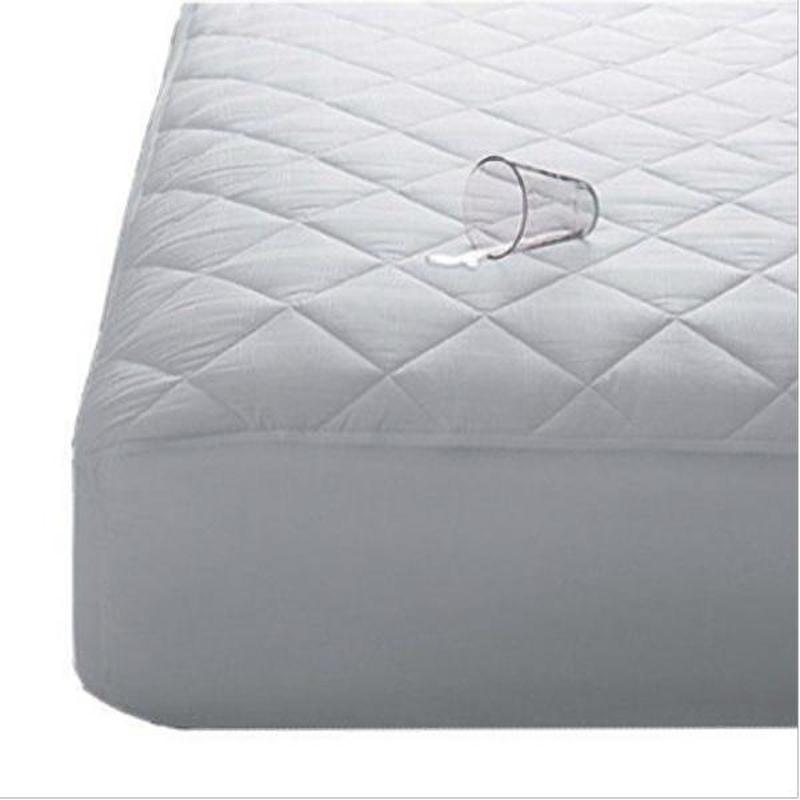 Fitted Waterproof Mattress Pad with glass of water